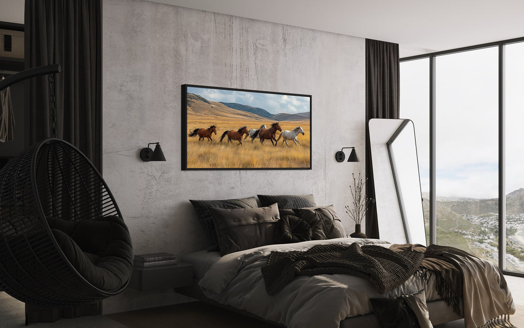 Galloping Wild Horses In Nature Canvas Wall Art above black bed