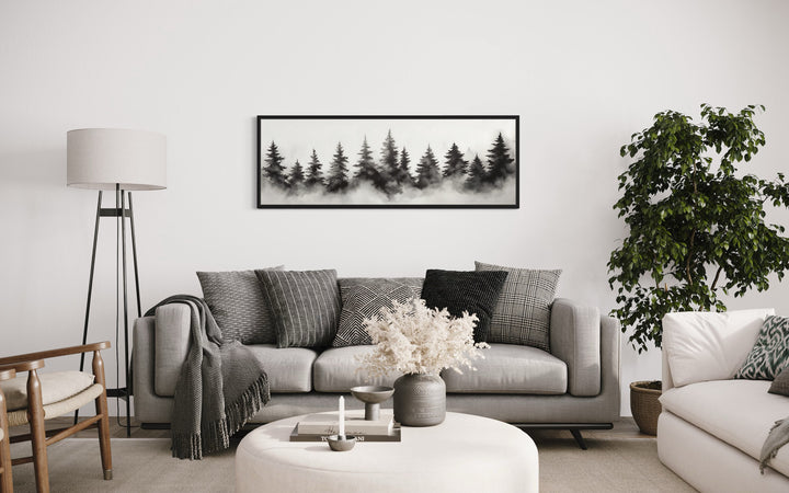 Black And White Watercolor Foggy Pine Tree Forest Horizontal Canvas Wall Art above grey couch