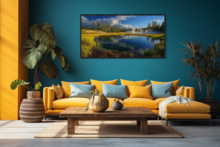 Yellowstone National Park Framed Canvas Wall Art above yellow couch