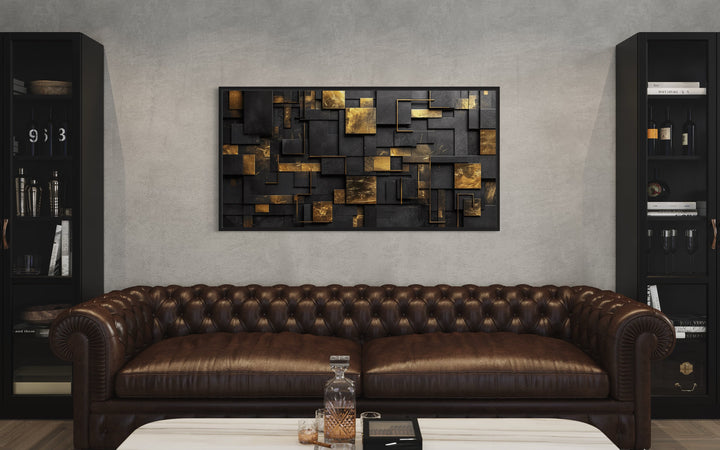 Black Gold Abstract Geometric Wall Art above broun couch