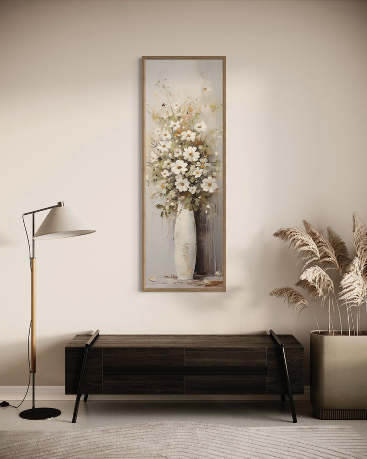 Tall Narrow White Wildflowers In Vase Farmhouse Vertical Wall Art in a hallway