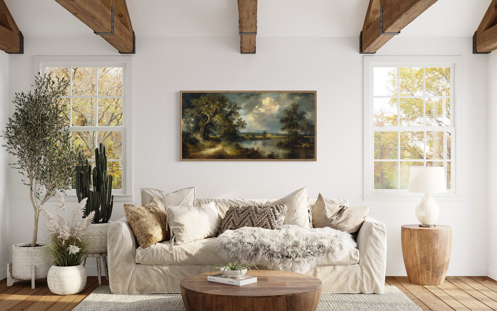 Vintage Lake Landscape Framed Canvas Wall Art above beige couch