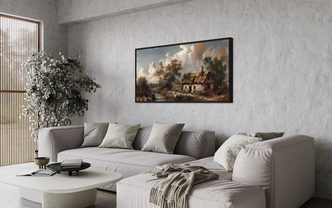 Old Cottage Near River Pastoral Antique Style Framed Canvas Wall Art above grey couch