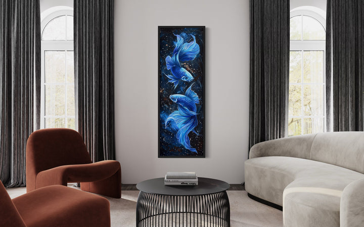 Tall Narrow Blue Betta Fish On Black Vertical Wall Art "Sapphire Swirl" in modern room with grey curtains