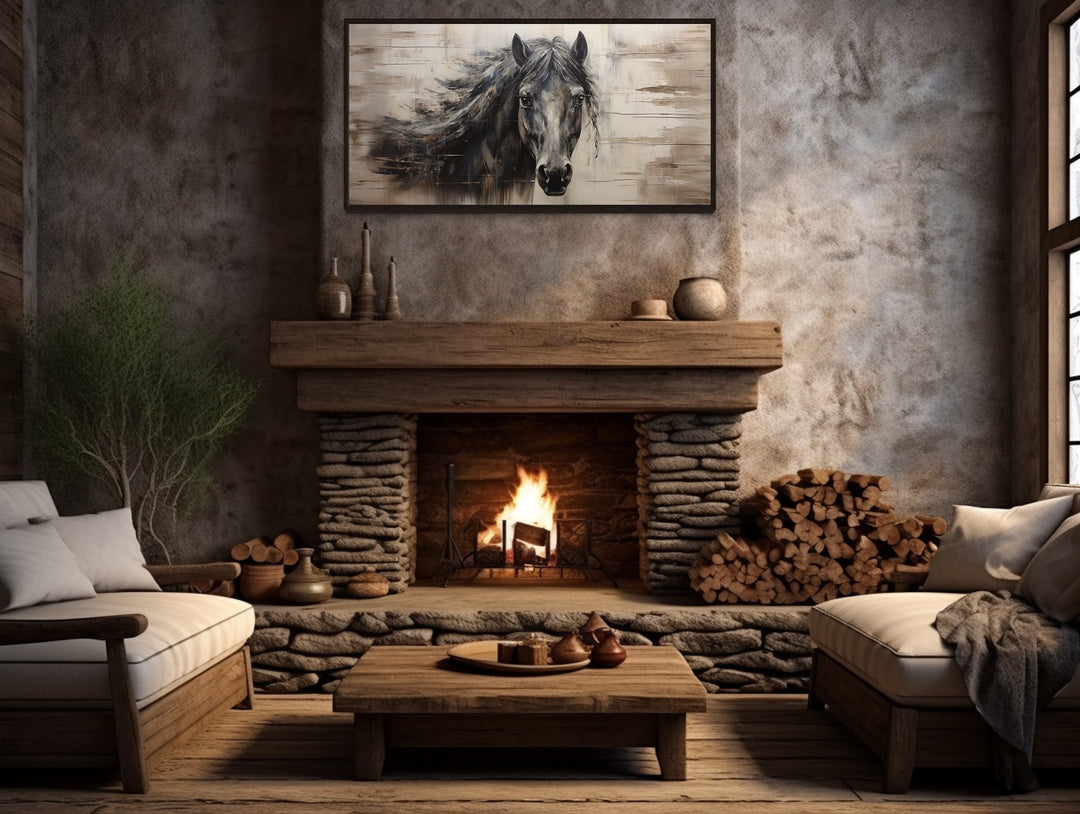 a living room with a fire place and a horse painting on the wall