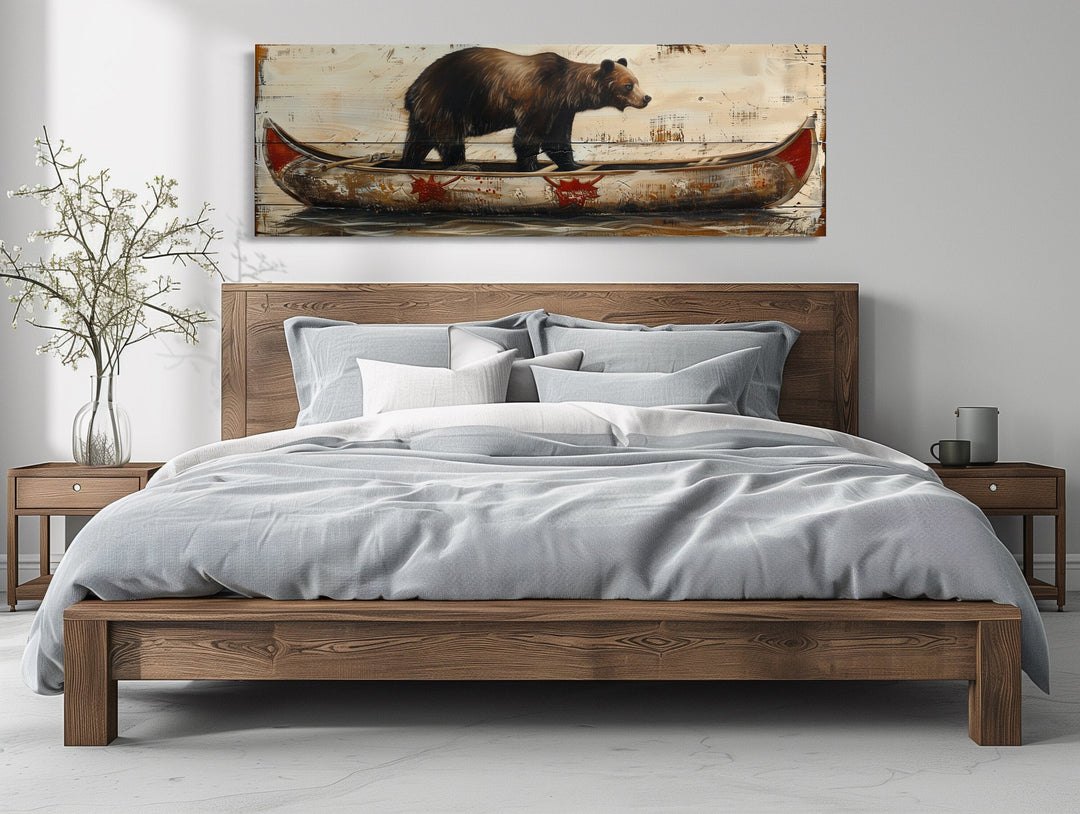 Bear In Canoe Cabin Wall Art over wooden bed