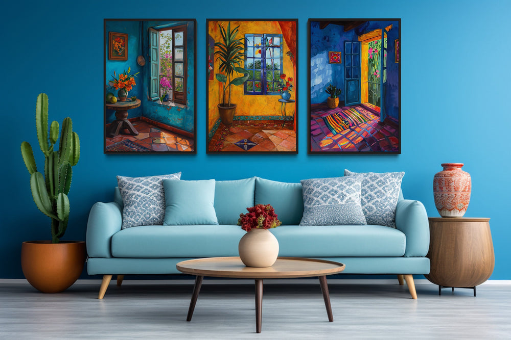 Set Of Three House And Window Mexican Wall Art above blue sofa