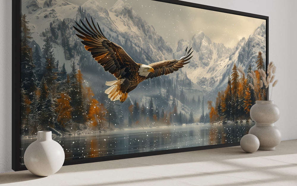 Bald Eagle Flying Over Snowy Mountain Lake Framed Canvas Wall Art side view