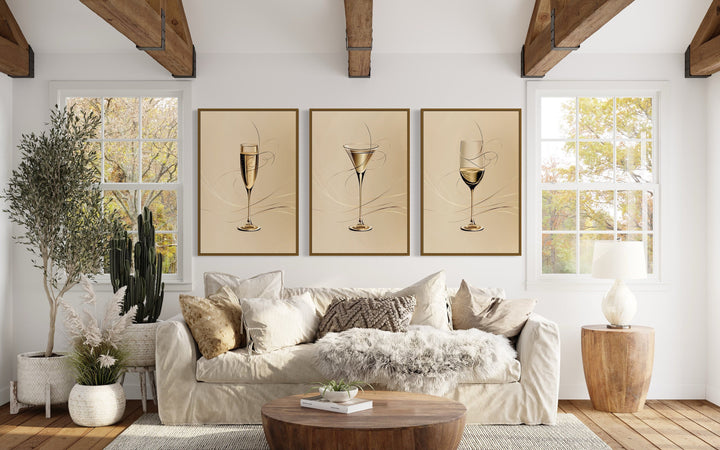 Wine Glass, Martini and Champagne Flute Neutral Wall Art above beige couch