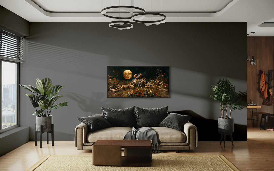 Eternal Love Skeletons in Flowers Meadow Under Moon Gothic Wall Art above black couch