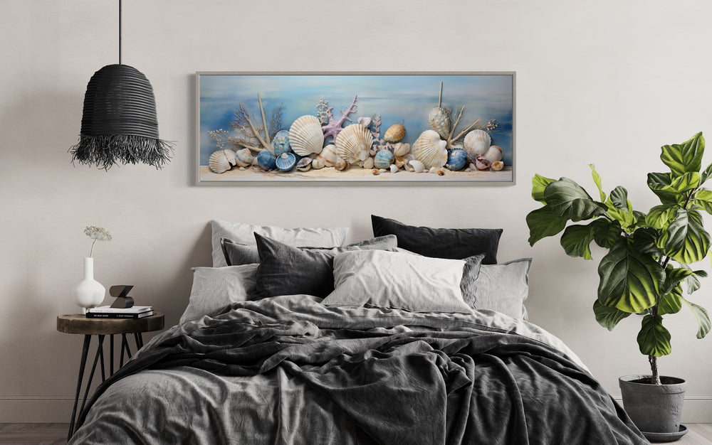 Seashells In Sand Panoramic Coastal Wall Art above bed