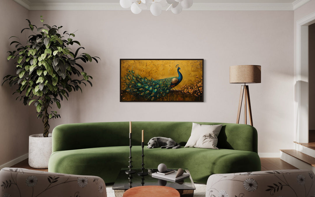 Peacock on Gold Background Framed Canvas Wall Art above green couch