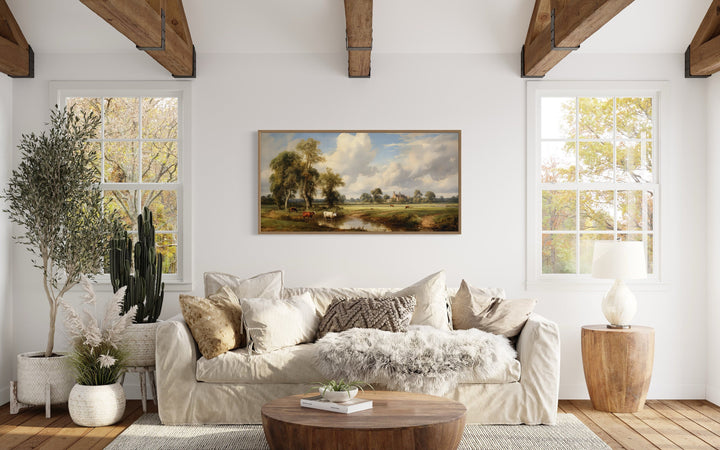 Pastoral Country Landscape with cows above beige couch