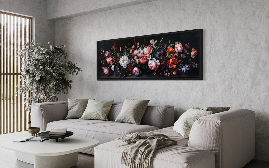 Moody Dark Flowers Antique Panoramic Canvas Wall Art above grey couch