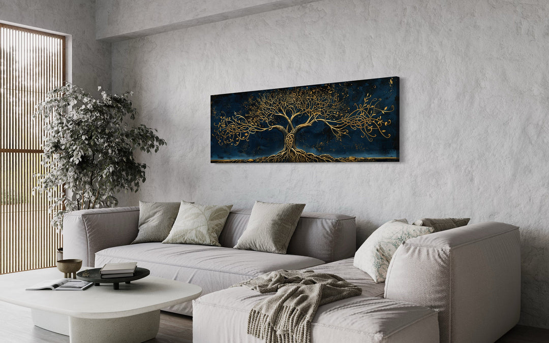 Navy Blue Gold Yggdrasil Panoramic Framed Canvas Wall Art above grey couch