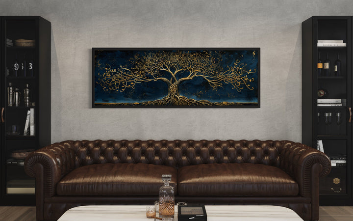 Navy Blue Gold Yggdrasil Panoramic Framed Canvas Wall Art above brown couch