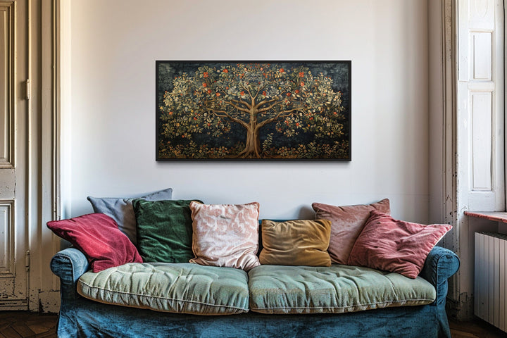 Antique Tapestry Style Tree Of Life Framed Canvas Wall Art above colorful couch