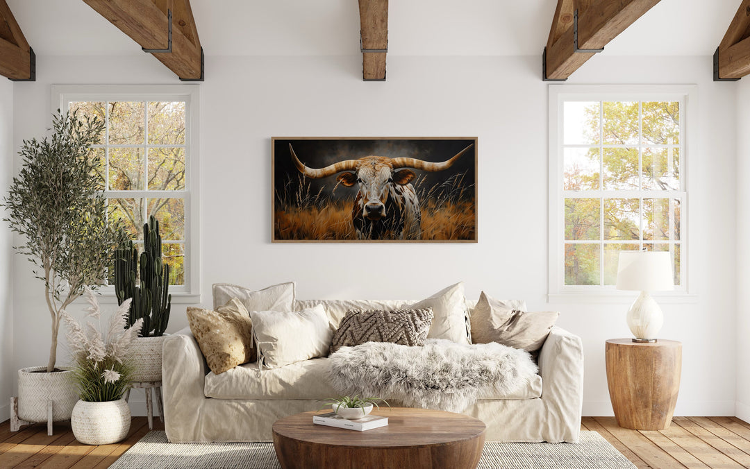Texas Longhorn Steer In Grass Dark Brown Painting Framed Canvas Wall Art above beige couch