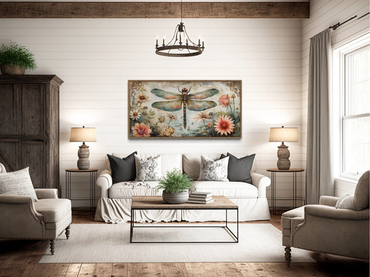 Rustic Dragonfly Illustration With Flowers Framed Canvas Wall Art above rustic couch