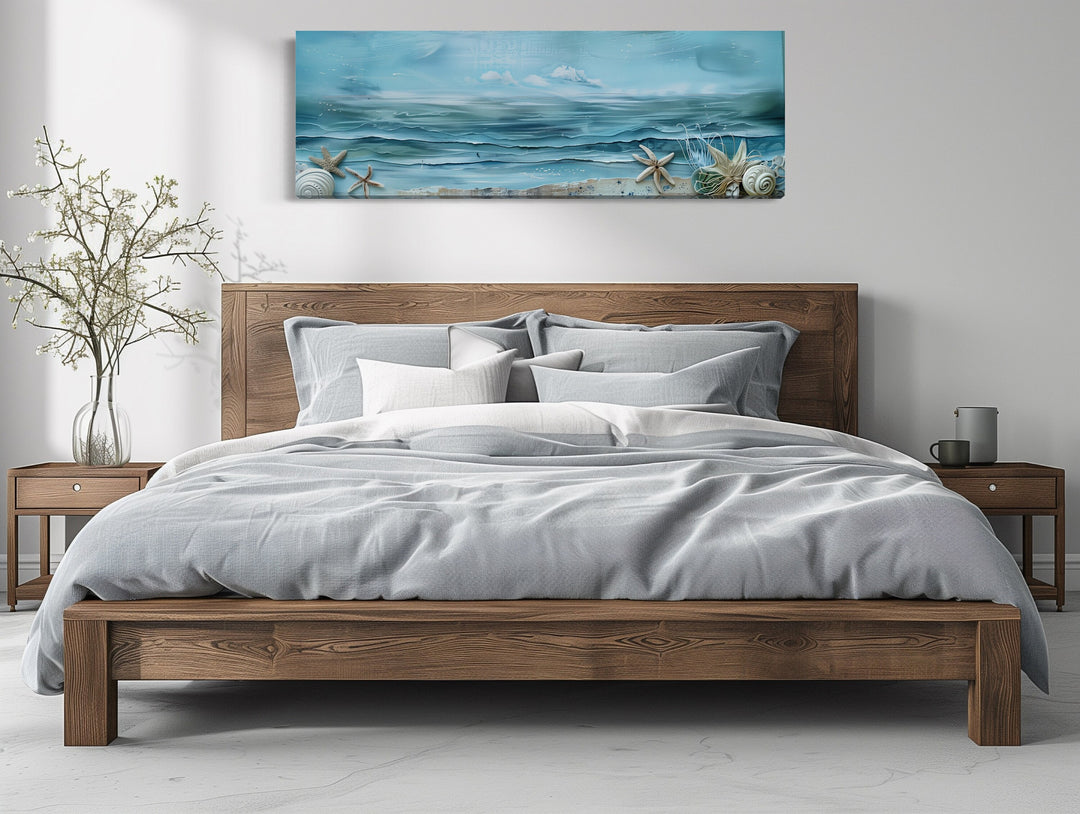 Long Horizontal Beach With Seashells Coastal Wall Art above bed