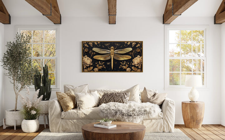 Black Gold Dragonfly With Flowers Framed Canvas Wall Art above beige couch