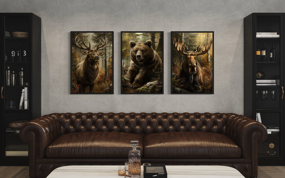 Set of 3 Cabin Wall Decor Forest Wildlife Animals - Bear, Moose And Elk Paintings above brown couch