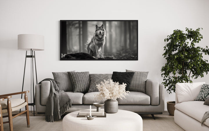Wolf In The Forest Black White Photography Framed Canvas Wall Art above grey couch