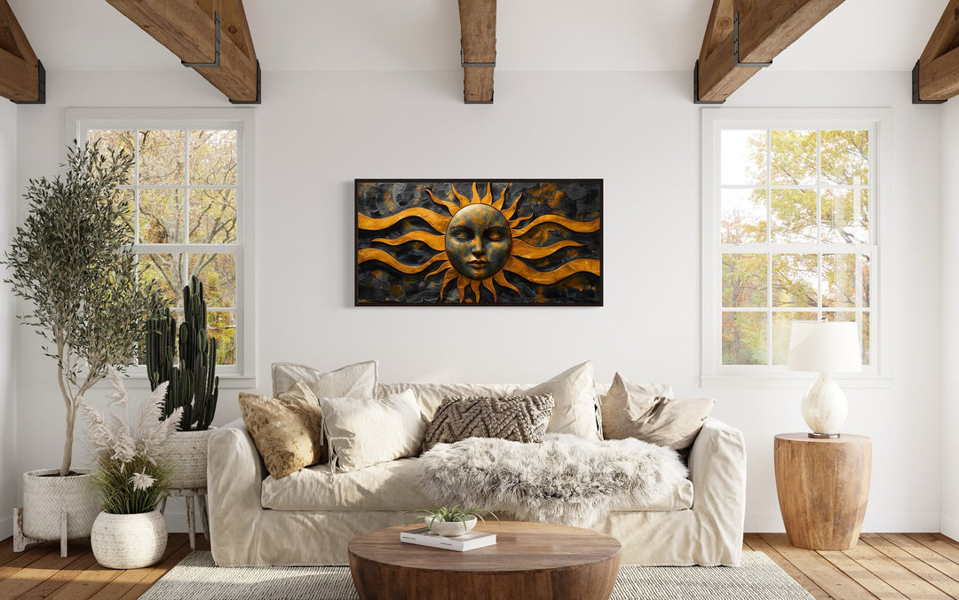 Black Gold Sun Celestial Framed Canvas Wall Art above beige couch