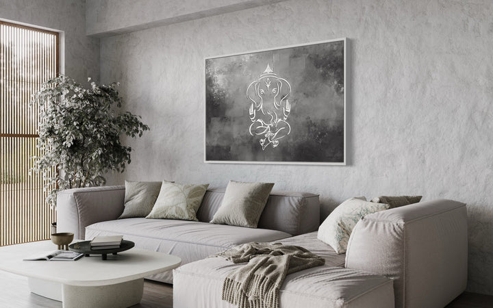 Grey Silver White Minimalist Lord Ganesh Framed Canvas Wall Art above couch in living room