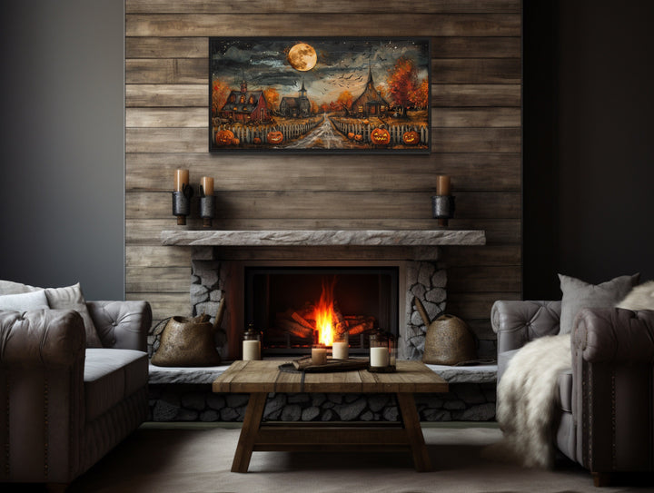 Cute Halloween Decorated Farm With Pumpkins, Bats, Full Moon Wall Art above fireplace