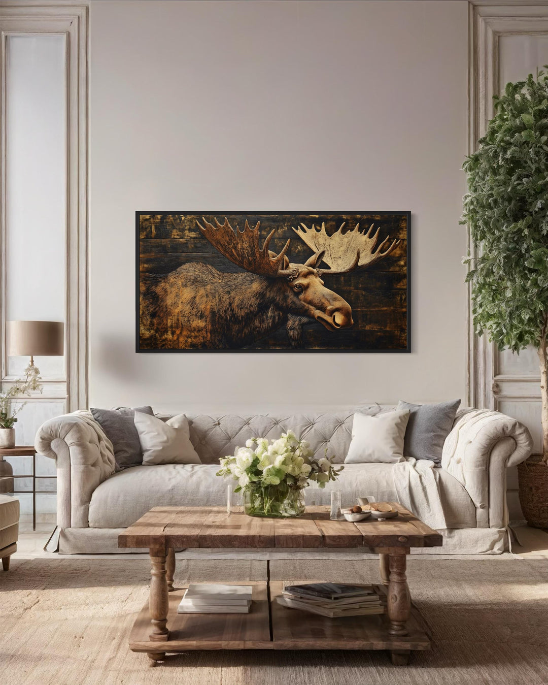 Moose Painted on Dark Wood Framed Canvas Wall Art in cabin living room