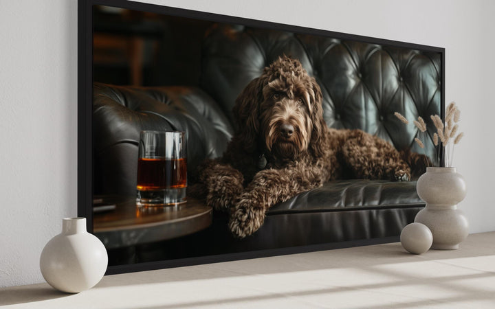 Chocolate Goldendoodle On Couch Drinking Whiskey Framed Canvas Wall Art side view