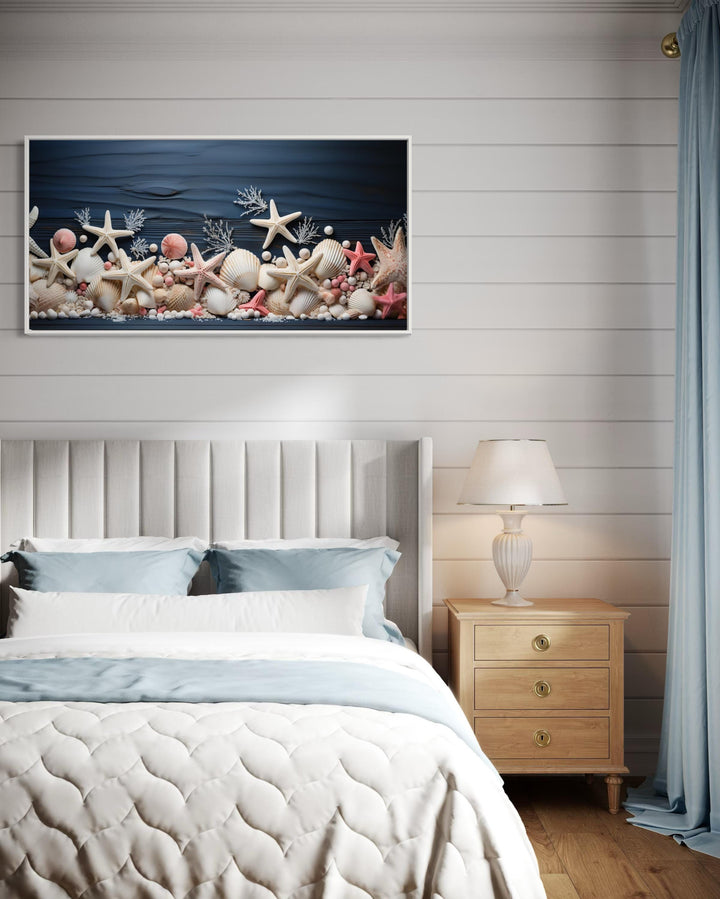 Pink Starfish And Seashells Painting On Navy Blue Wood Texture Wall Art above coastal bed