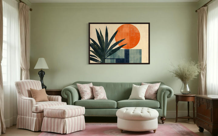 Mid Century Modern Geometric Sun And Palm Leaves Wall Art above green couch