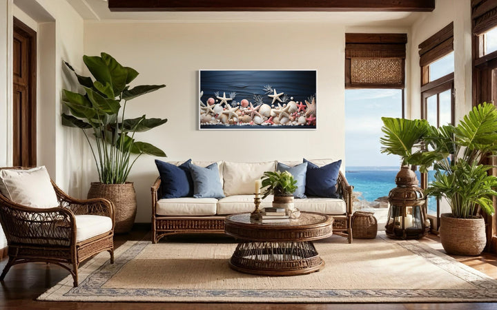 Pink Starfish And Seashells Painting On Navy Blue Wood Texture Wall Art in coastal living room