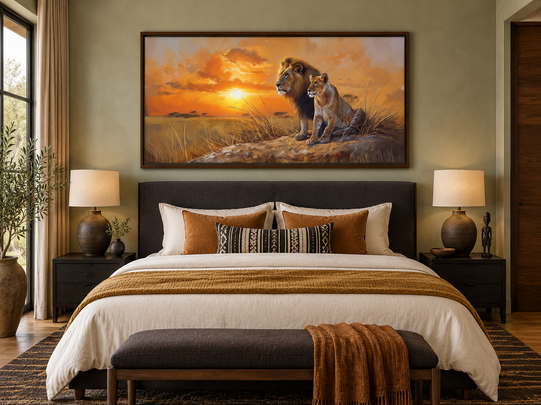 Lion and lioness framed canvas print above a bed in a rustic bedroom with African savannah decor.
