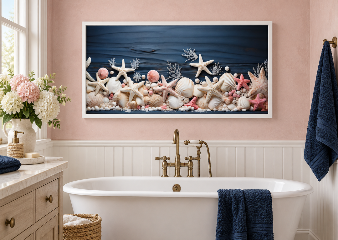Pink starfish and seashells painting on navy blue wood texture in a white frame over a bathtub.