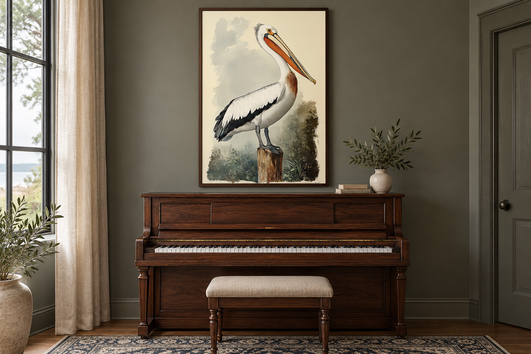 Vintage Pelican Framed Canvas Wall Art hanging above a dark wood piano in a moody green room.
