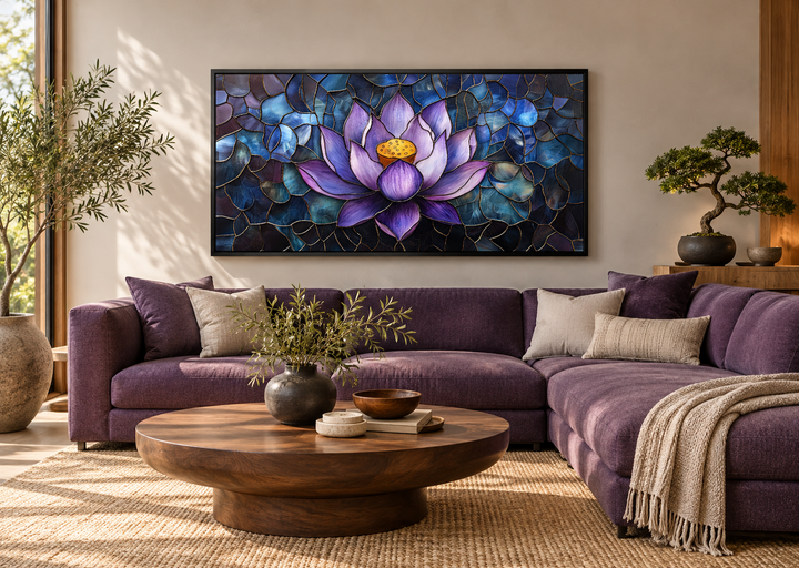 Purple lotus flower stained glass style framed canvas wall art above a purple sectional sofa.