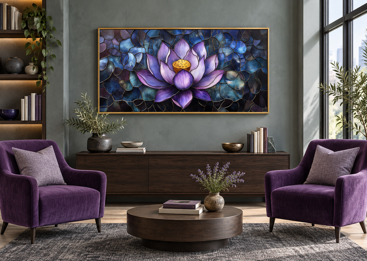 Framed canvas wall art of a purple lotus flower in a stained glass style over a living room console.