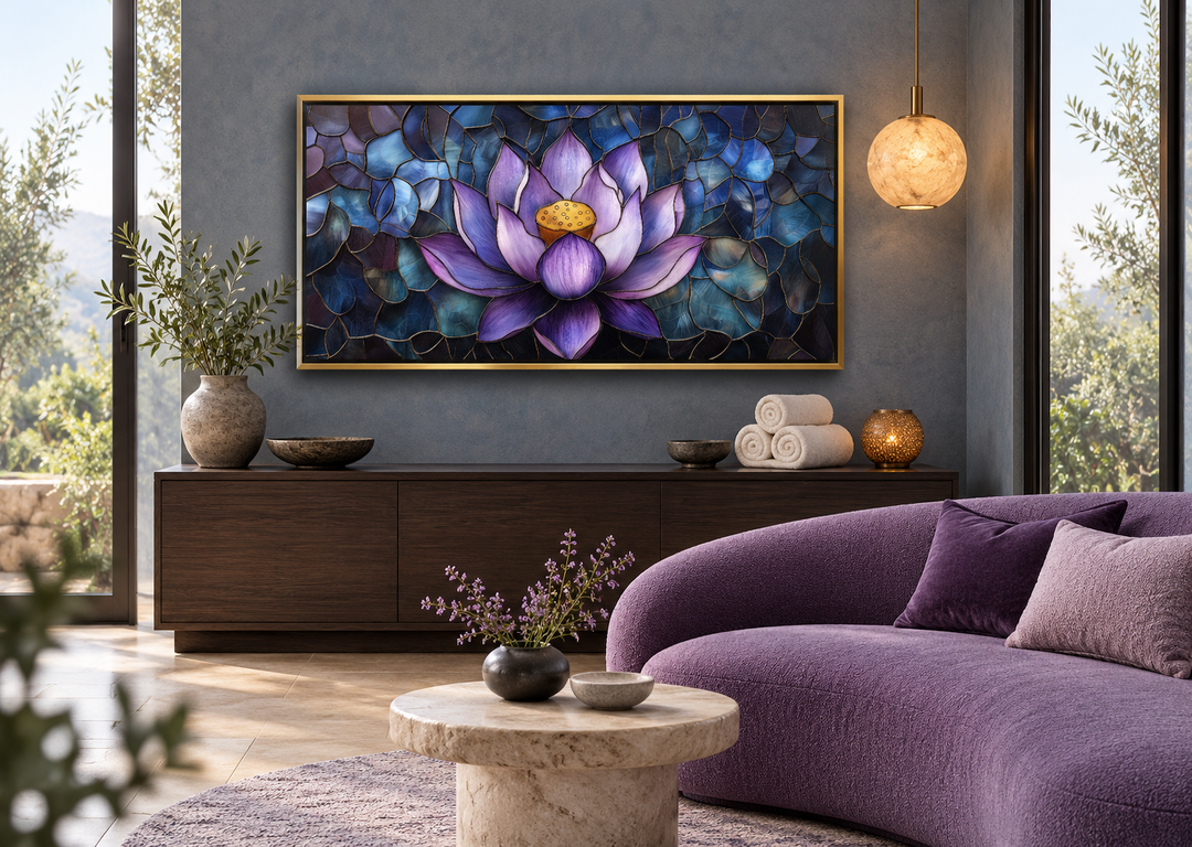 Purple lotus flower stained glass style framed canvas wall art in a gold frame above a dark console.