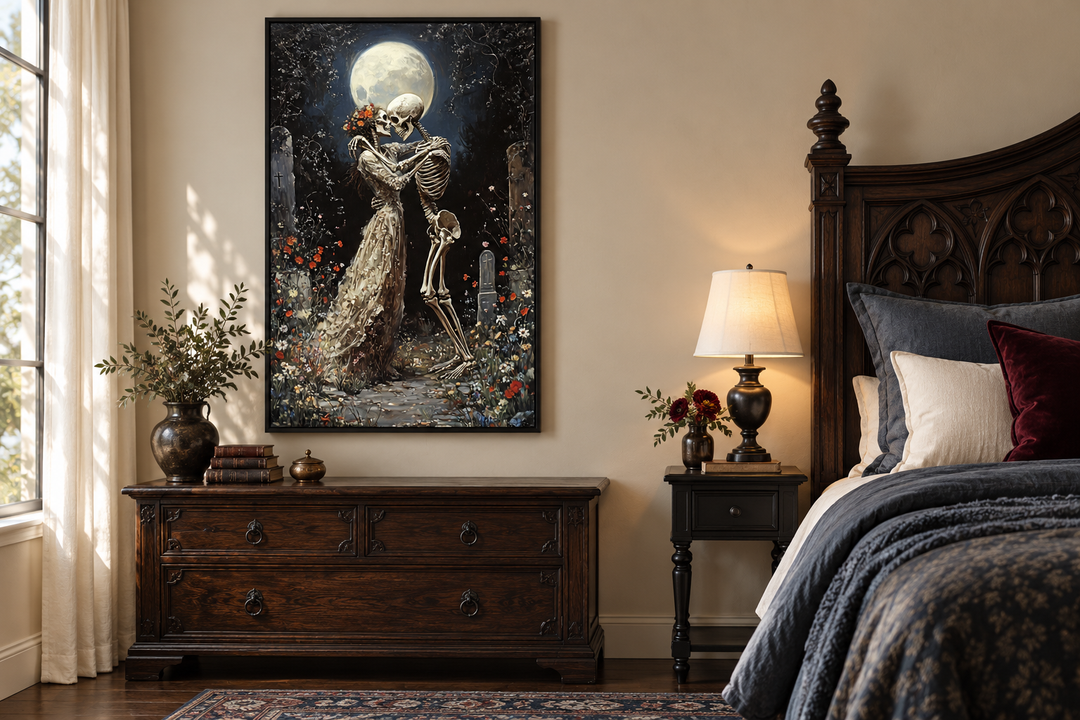 Gothic wall art of two skeletons dancing in a moonlit cemetery above a dark wood dresser.