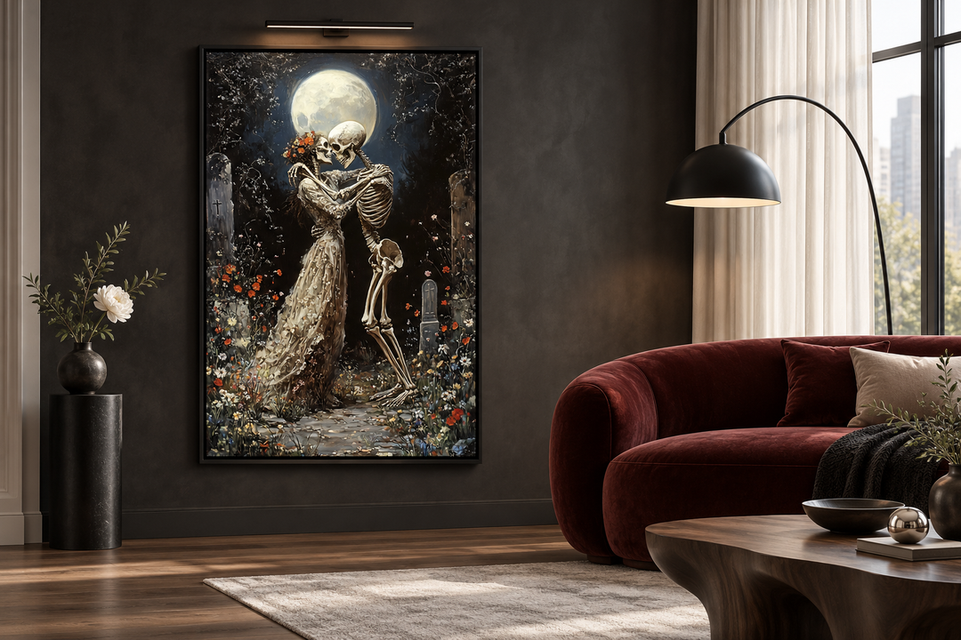 Romantic gothic wall art of two skeletons dancing in a moonlit cemetery, framed in a dark room.