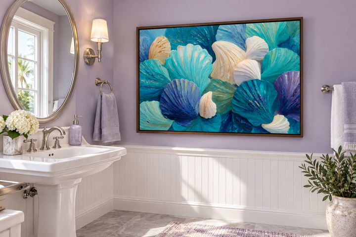 Teal Blue Aqua Shell abstract wall art in a walnut frame above white wainscoting in a bathroom.
