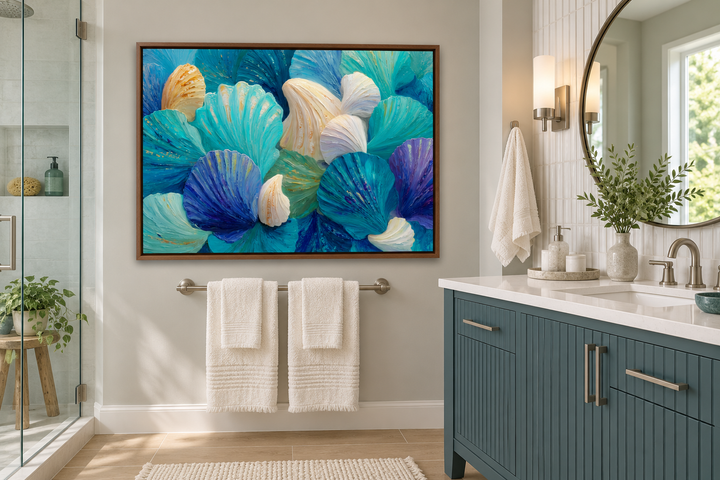 Teal blue and aqua abstract shell wall art in a walnut frame above a bathroom towel rack.