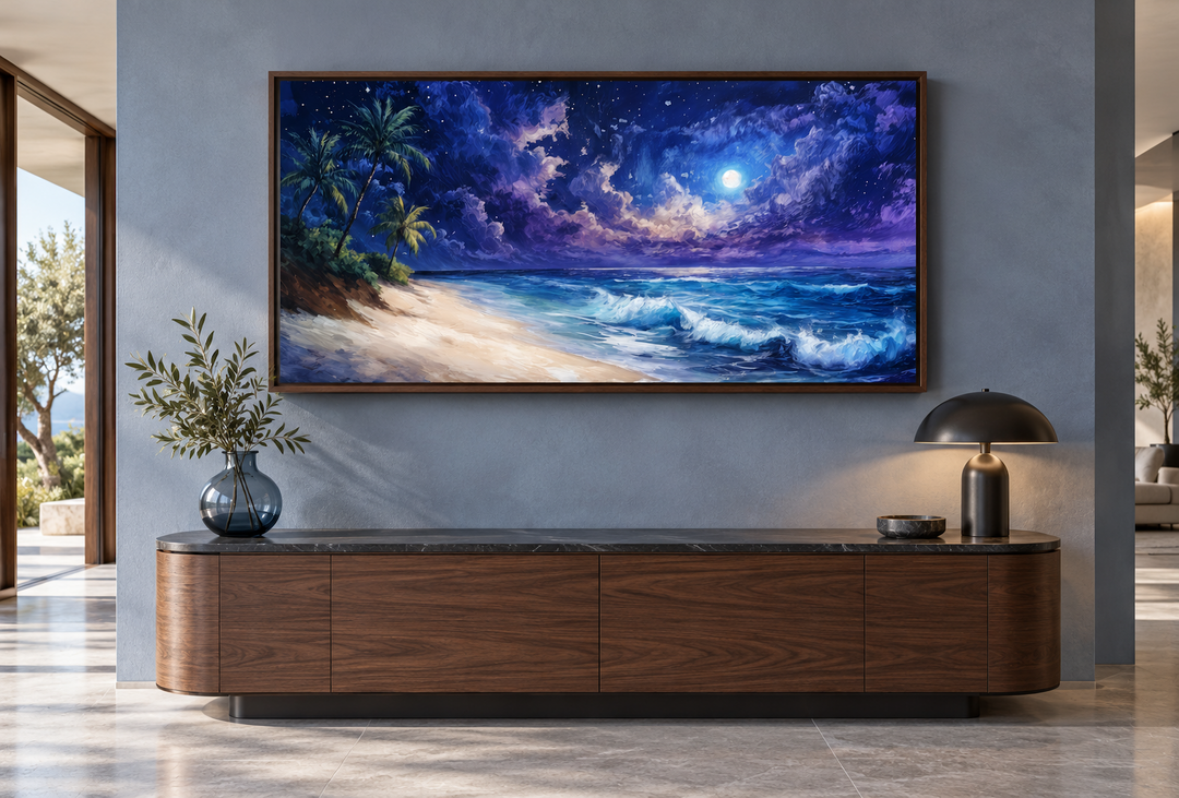 Tropical beach at night under starry sky framed canvas wall art above a walnut sideboard.