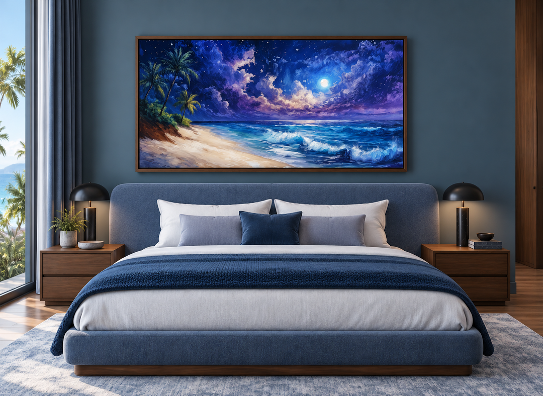 Tropical beach at night under a starry sky framed canvas wall art above a bed in a modern bedroom.