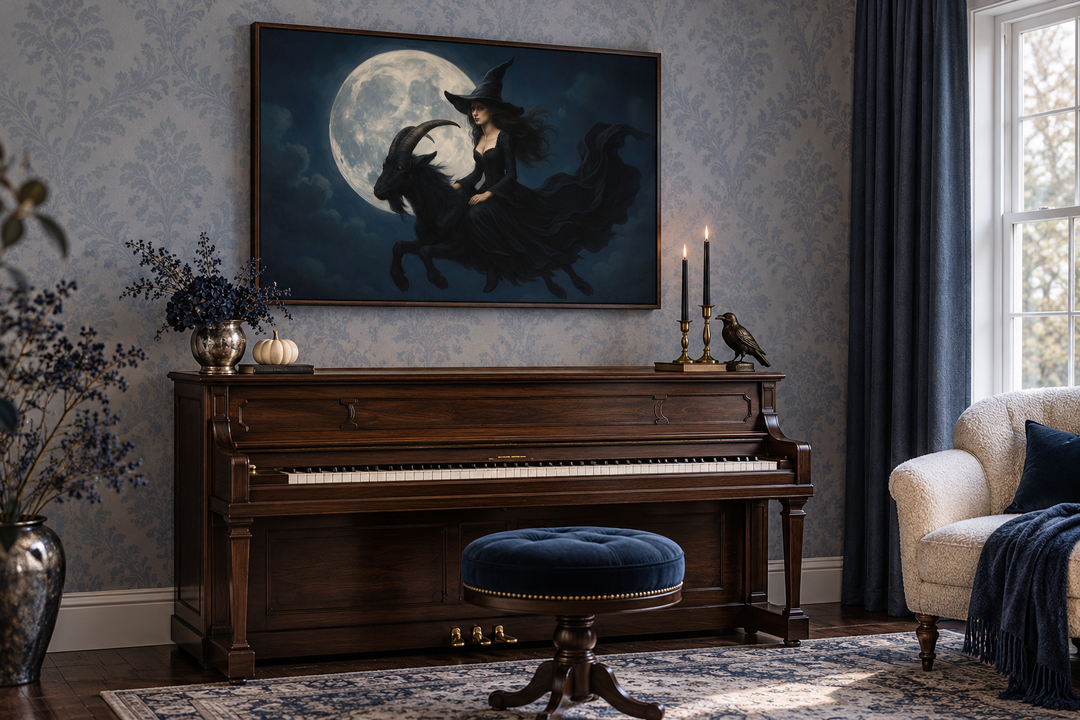 Witch flying on a black goat at full moon canvas wall art in a walnut frame above a piano.