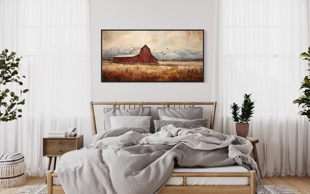 Red Barn Farmhouse Rustic Wall Art "Homestead Horizon" in black frame haning over wooden bed