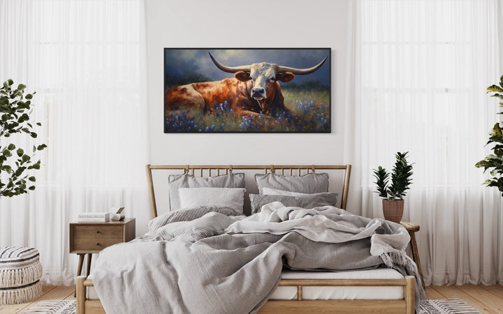 Texas Longhorn Cow Wall Art "Bluebonnet Serenade" over wooden bed